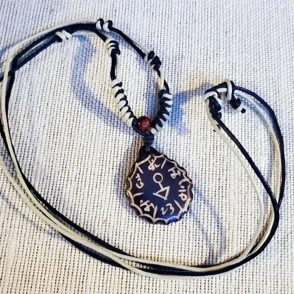 Hand Crafted Tribal Buffalo Bone Sanskrit Symbols Necklace from India